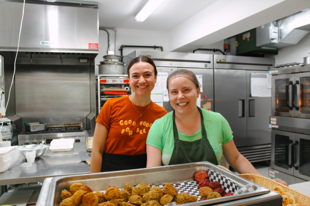 Katerina and Victoria serve at Community Lunch